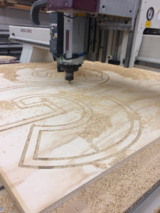 CNC router cutting plywood